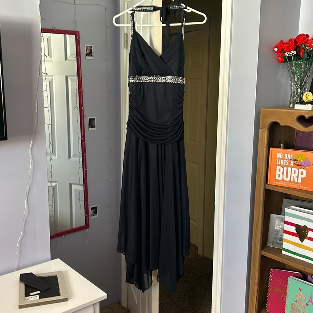 A formal dress 
Dark blue 
Large size 
Trixxi brand